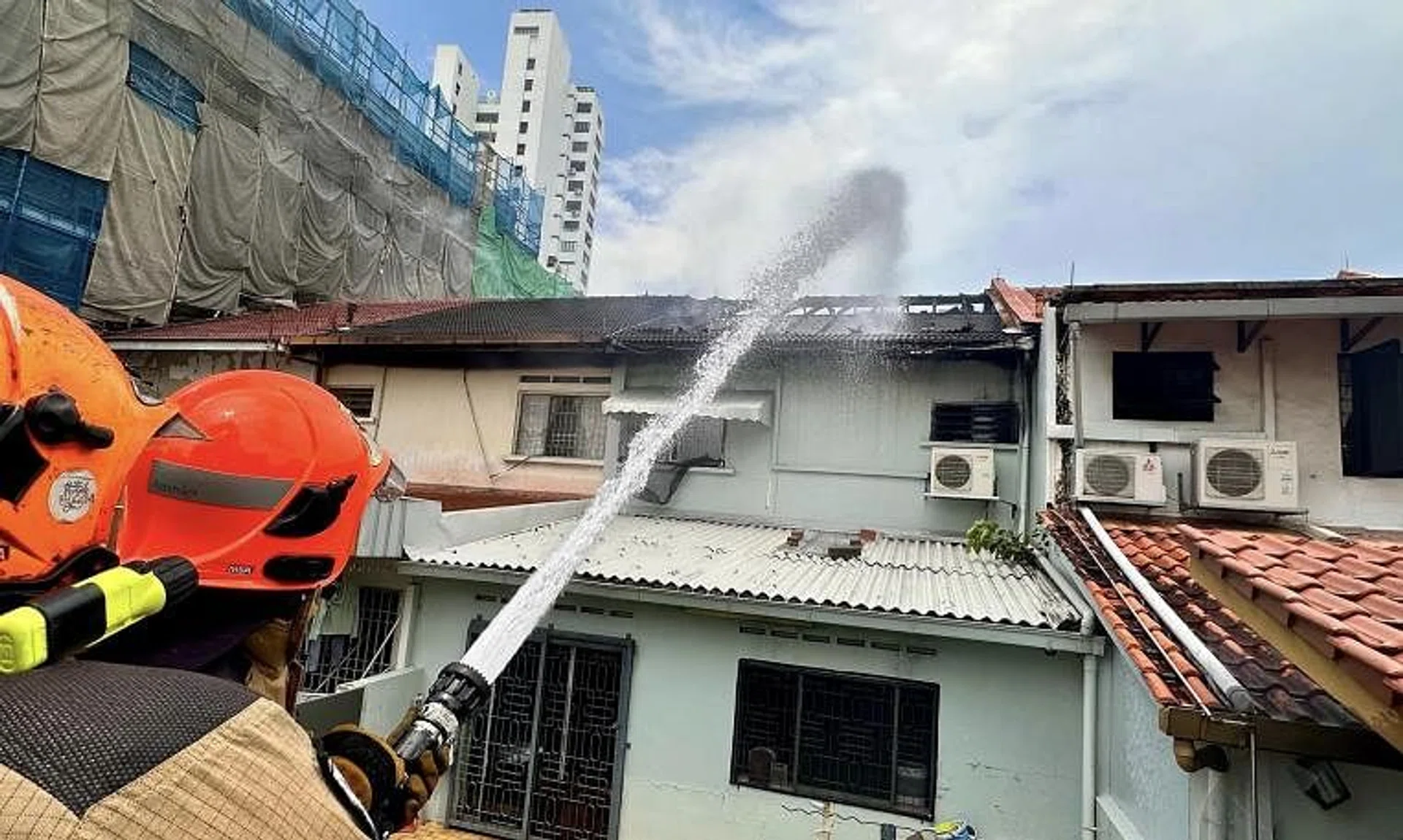 Firefighters used seven water jets at the height of the operation, said the Singapore Civil Defence Force.