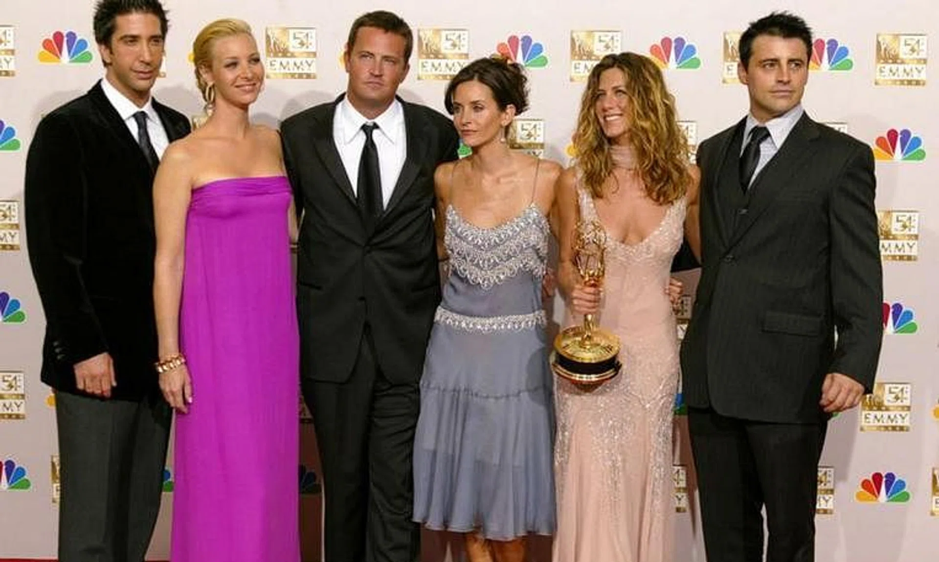 FILE PHOTO: David Schwimmer, Lisa Kudrow, Matthew Perry, Courteney Cox Arquette, Jennifer Aniston and Matt LeBlanc of \"Friends\", appear in the photo room at the 54th annual Emmy Awards in Los Angeles, U.S., September 22, 2002. REUTERS/Mike Blake/File Photo