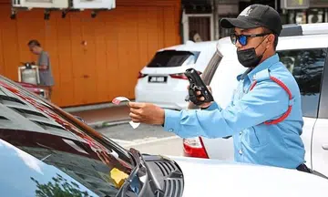 Use an app, not coupons, to pay for parking in JB