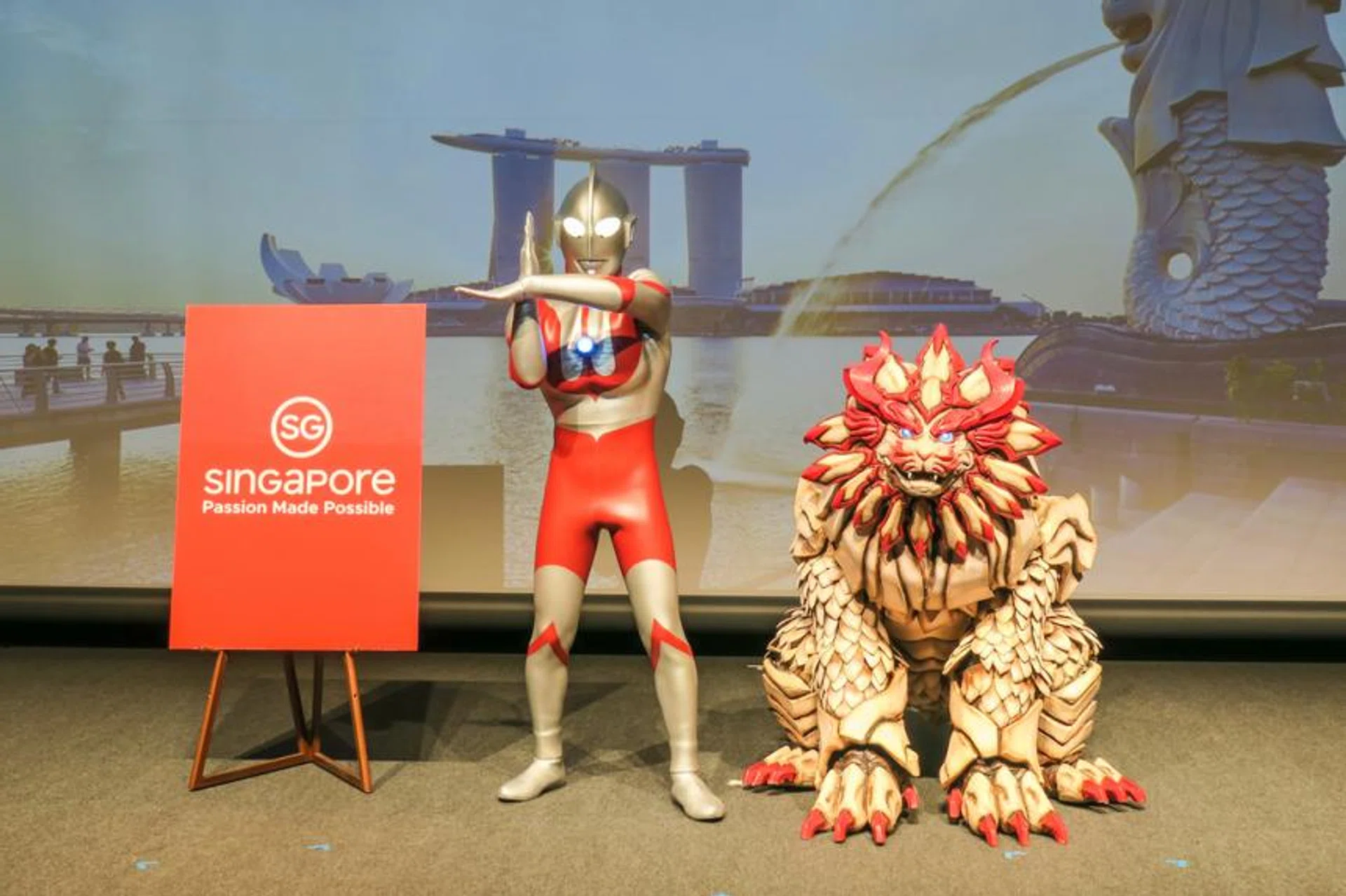 Japanese superhero Ultraman and the superhero version of the Merlion in Shibuya, Tokyo, on April 12, 2022. 