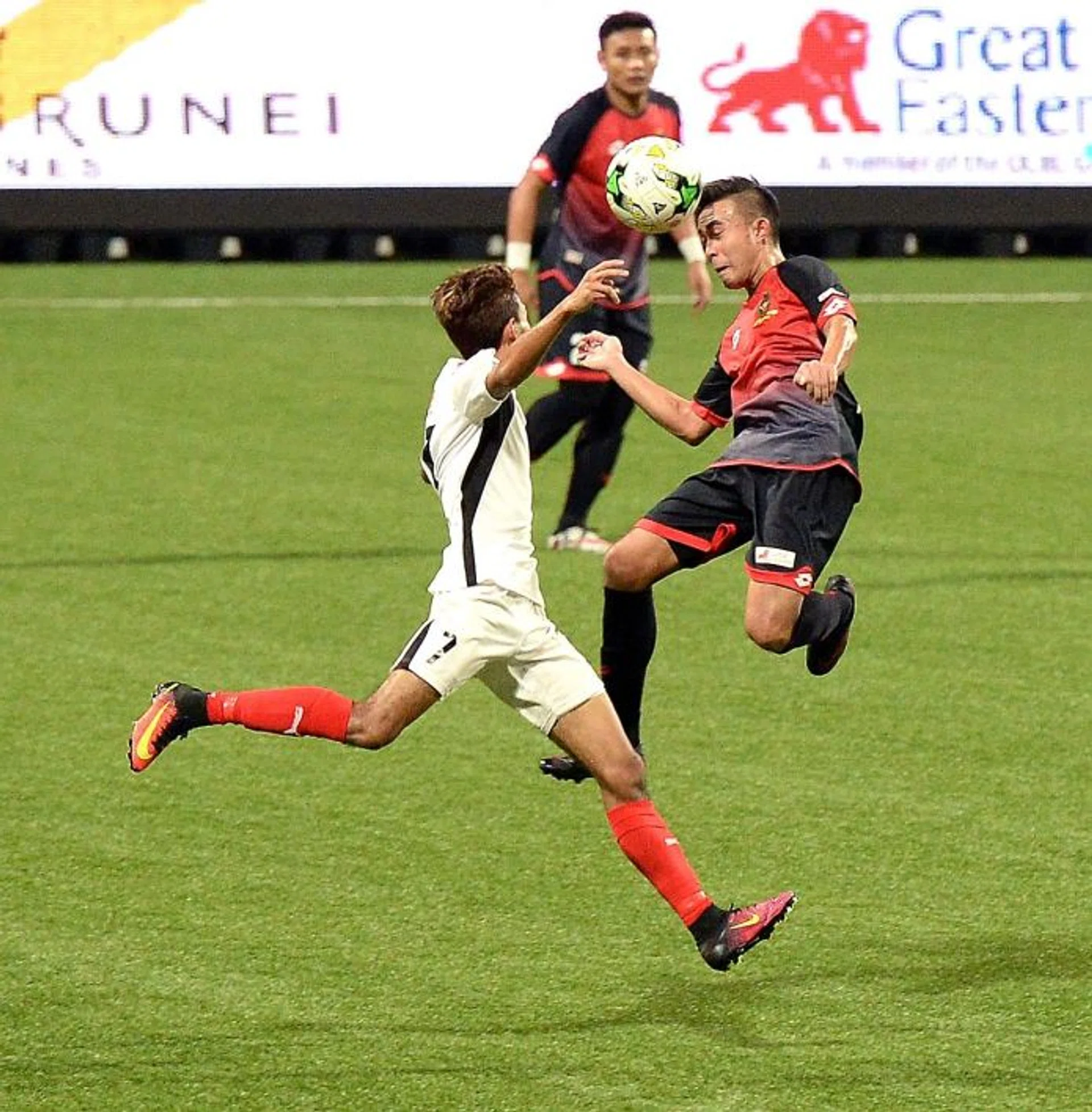 HISTORY IN  THE MAKING: Brunei DPMM (in red and black) are one win away from a record four League Cup title triumphs, having won in 2009, 2012 and 2014.