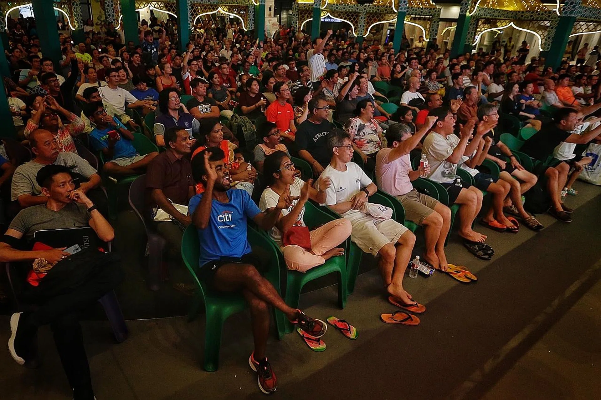 The crowd at Our Tampines Hub - one of the venues under PA that is screening free World Cup matches - reacting when Russia scored the second goal against Saudi Arabia during the opening match last week. 