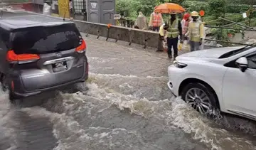 Ankle-deep water in Bukit Timah following heavy rain