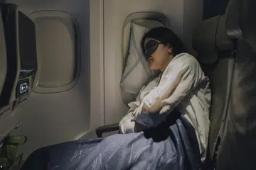 Go on, recline your seat: Experts offer eight tips for a more restful flight