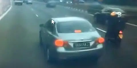 Driver who slammed into bike arrested