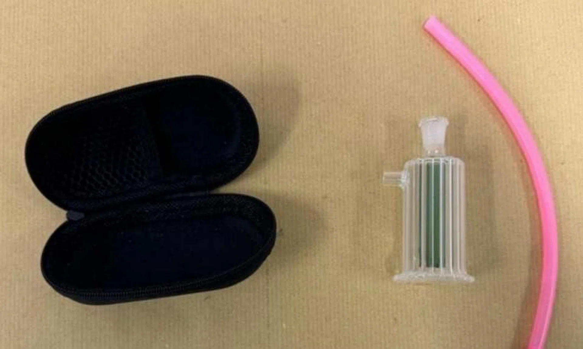 A drug smoking apparatus and pouch recovered from one of the 13-year-old girls arrested on Feb 6.