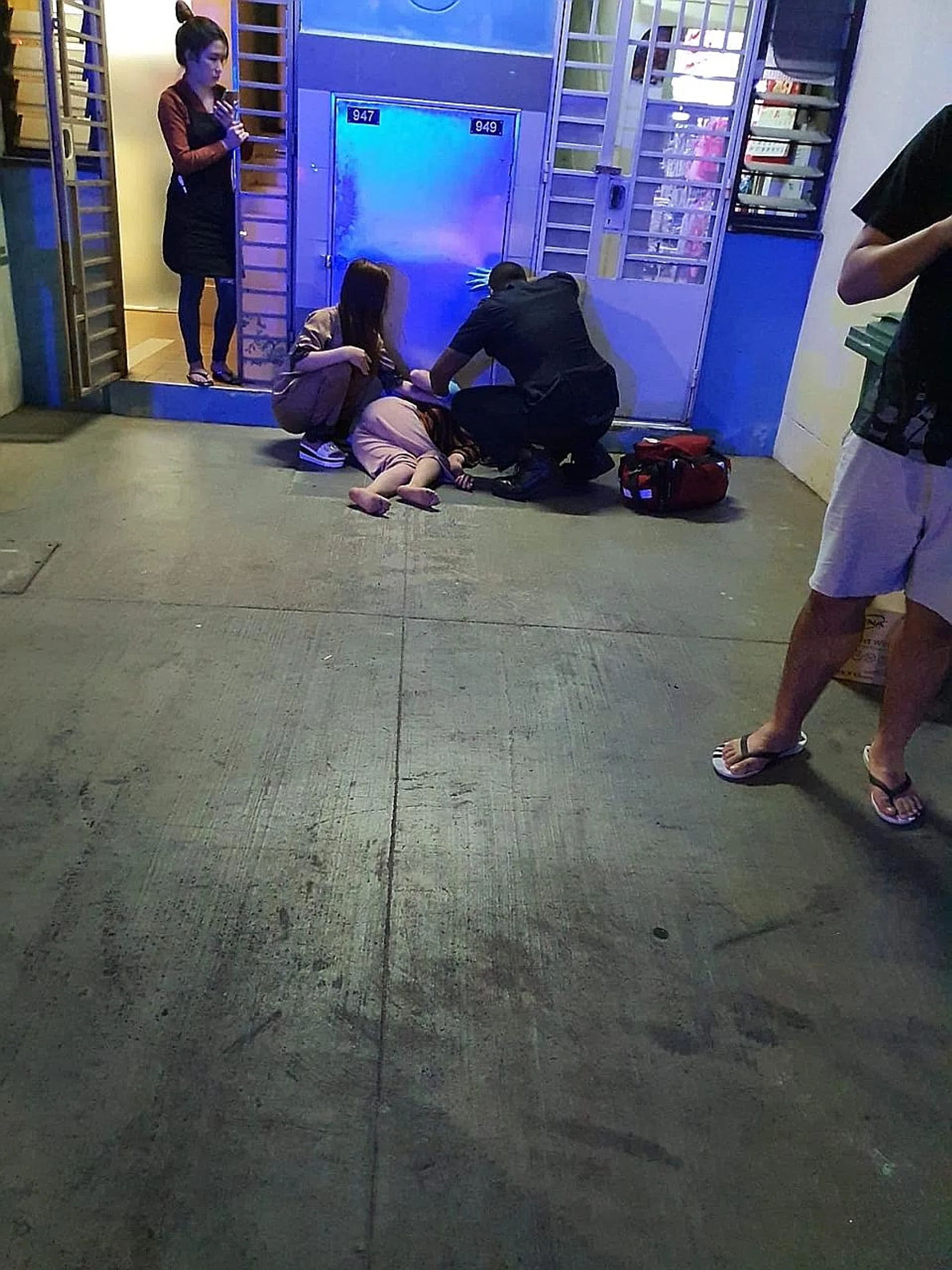 The victim fell from the fourth storey clutching a pole that got stuck briefly on a clothes rack on the second storey, helping to lessen the impact of her fall. 
