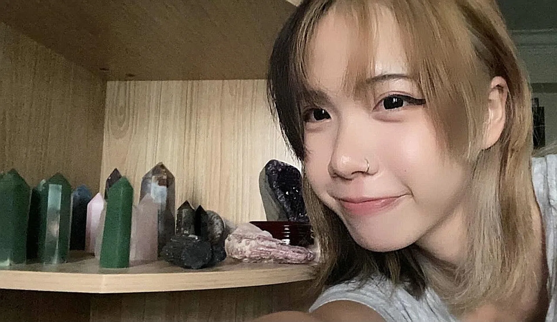 (Above) Student Jovelle Teo, 16, with her crystal collection. She has started to sell crystals on her Instagram store. 