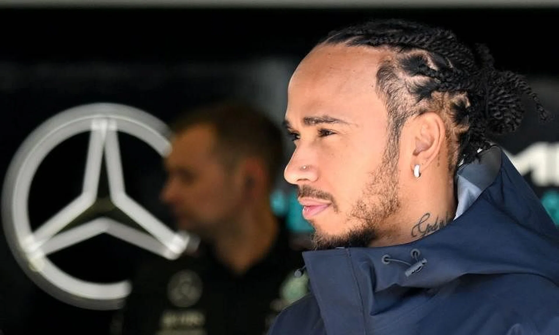 Mercedes driver Lewis Hamilton arriving in the garage ahead of the first practice session of the Bahrain Formula One Grand Prix.