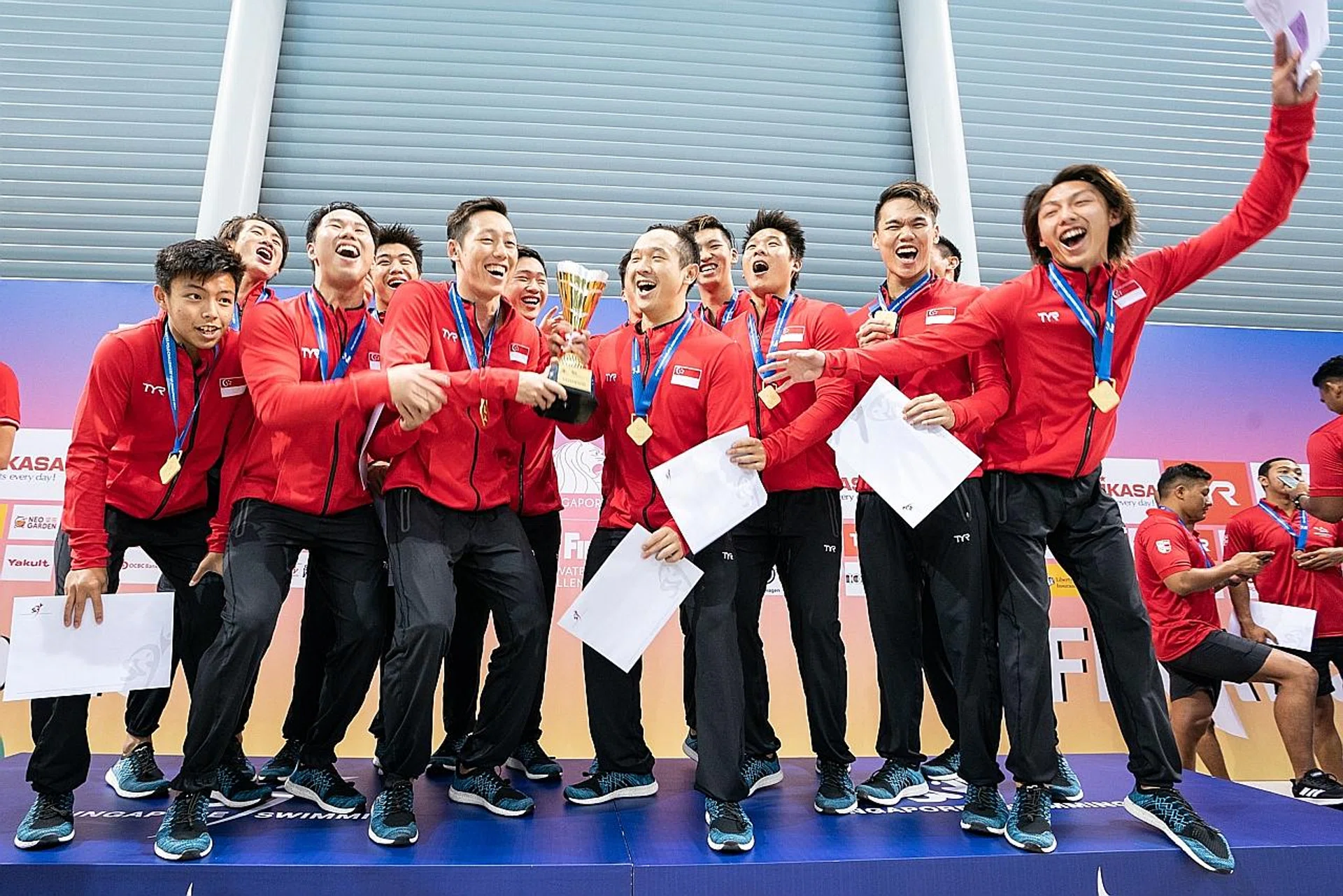 Singapore celebrate their Fina Water Polo Challengers Cup win. 