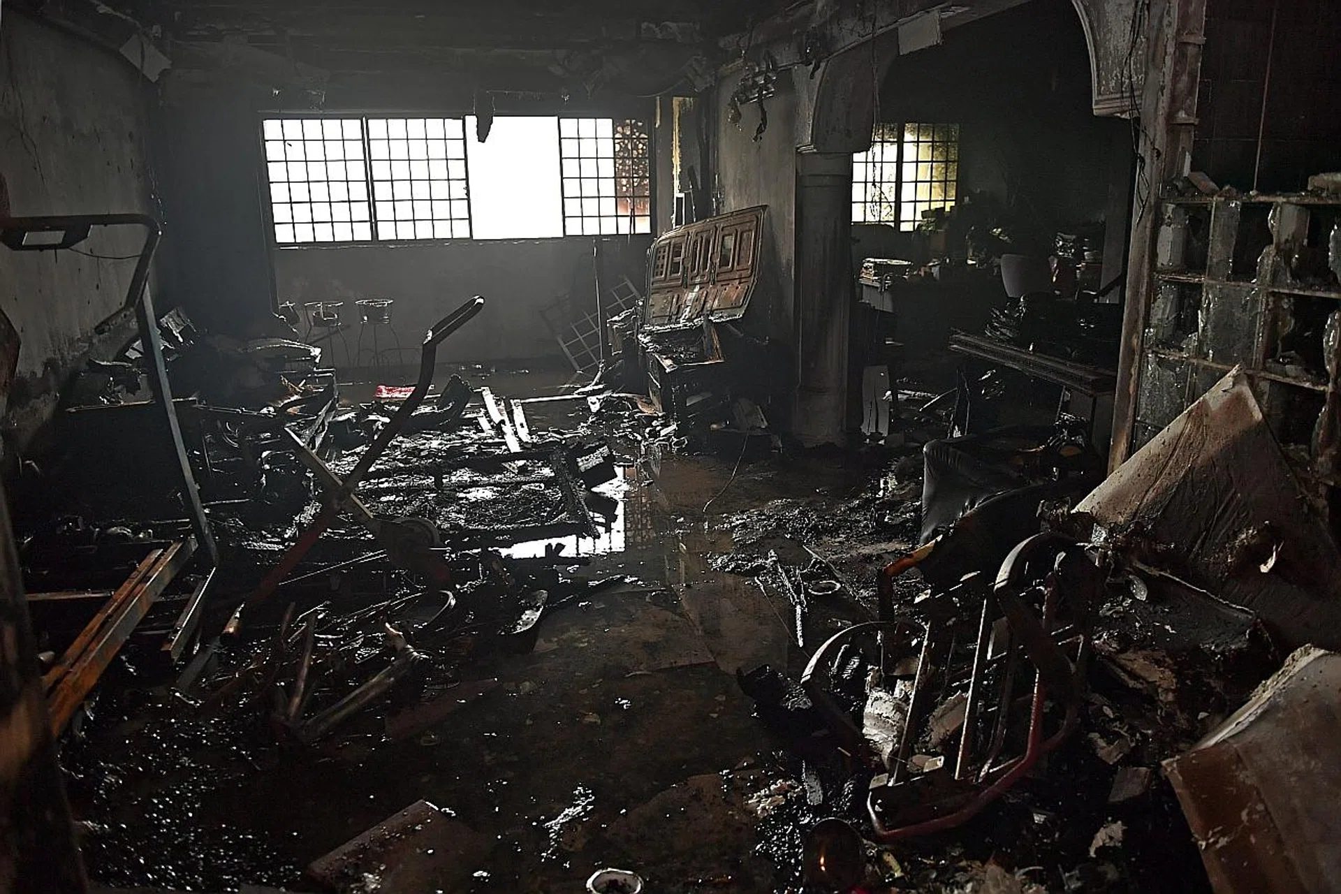 The living room of the burnt 15th-storey unit. 