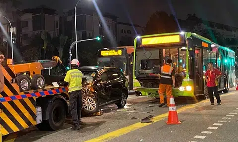 Woman taken to hospital after accident involving Go-Ahead Singapore bus and car