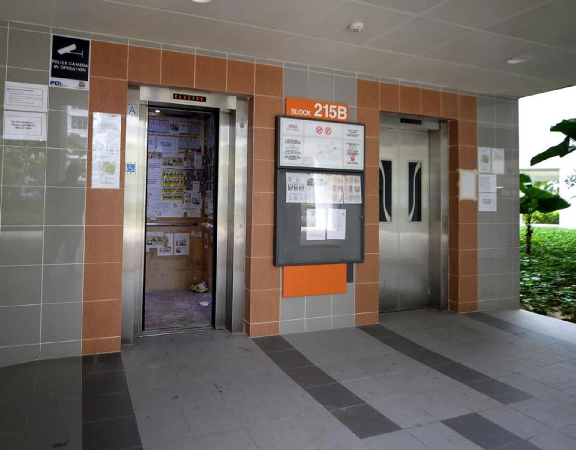 The lift lobby of Blk 215B Compassvale Drive/