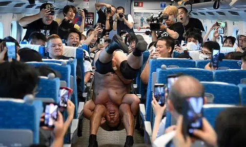 Japanese wrestlers in all-out high-speed brawl entertain passengers on bullet train