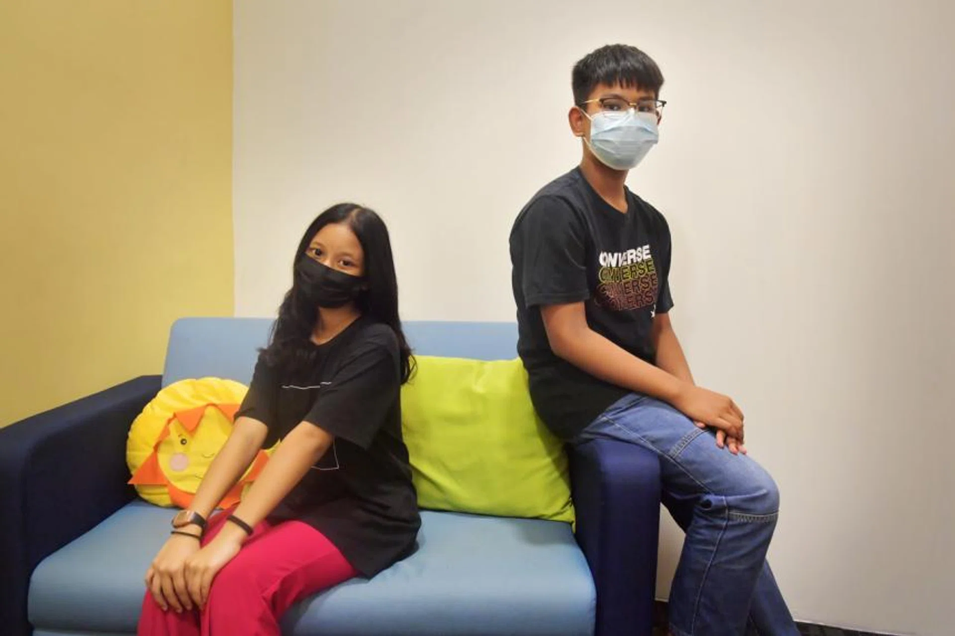 Mohammad Zaihairy Qushairy Mohammad Zaidi (right) and Shim Nur Istin Sherfoel Herman prefer to keep their masks on. 