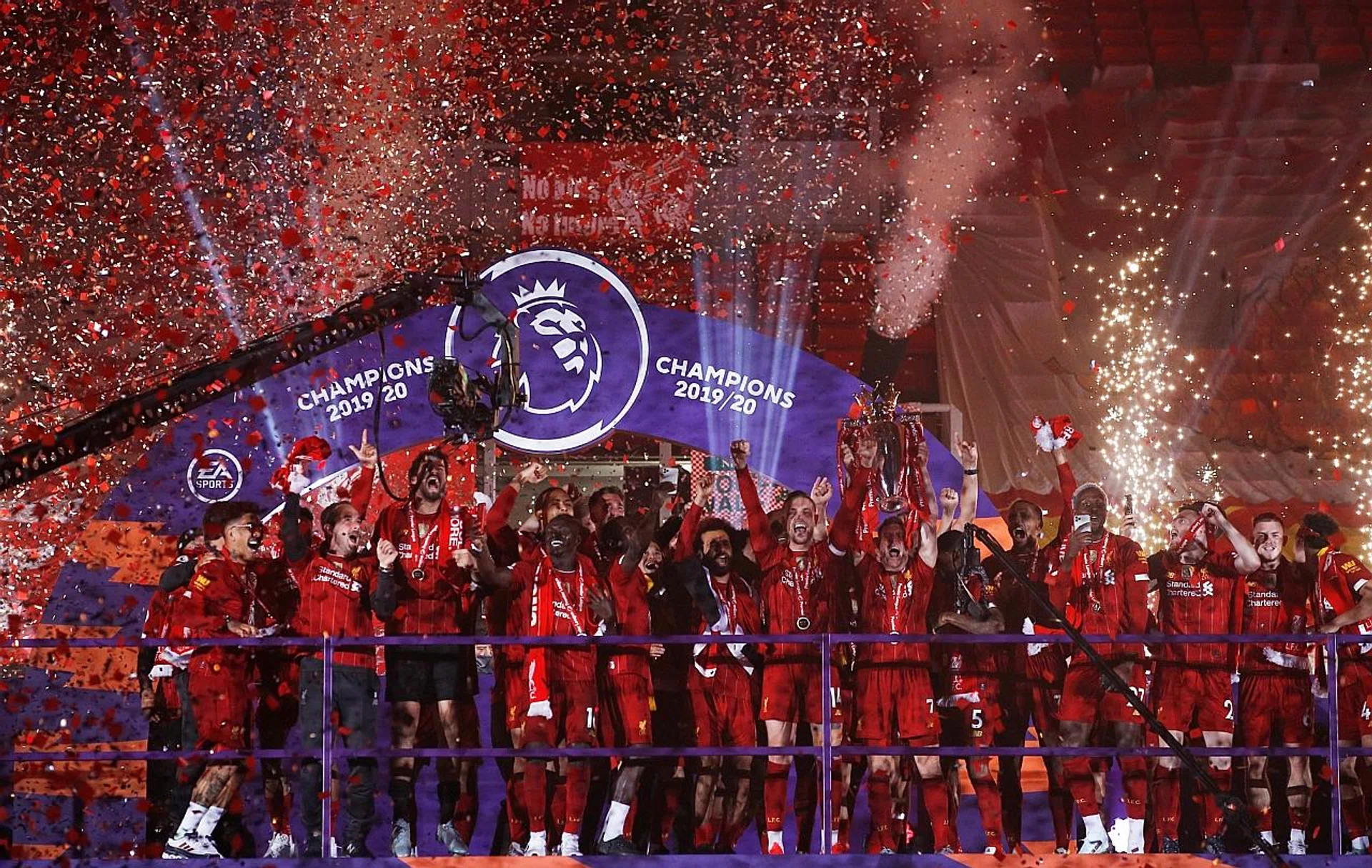 Liverpool celebrating after lifting the Premier League trophy. 