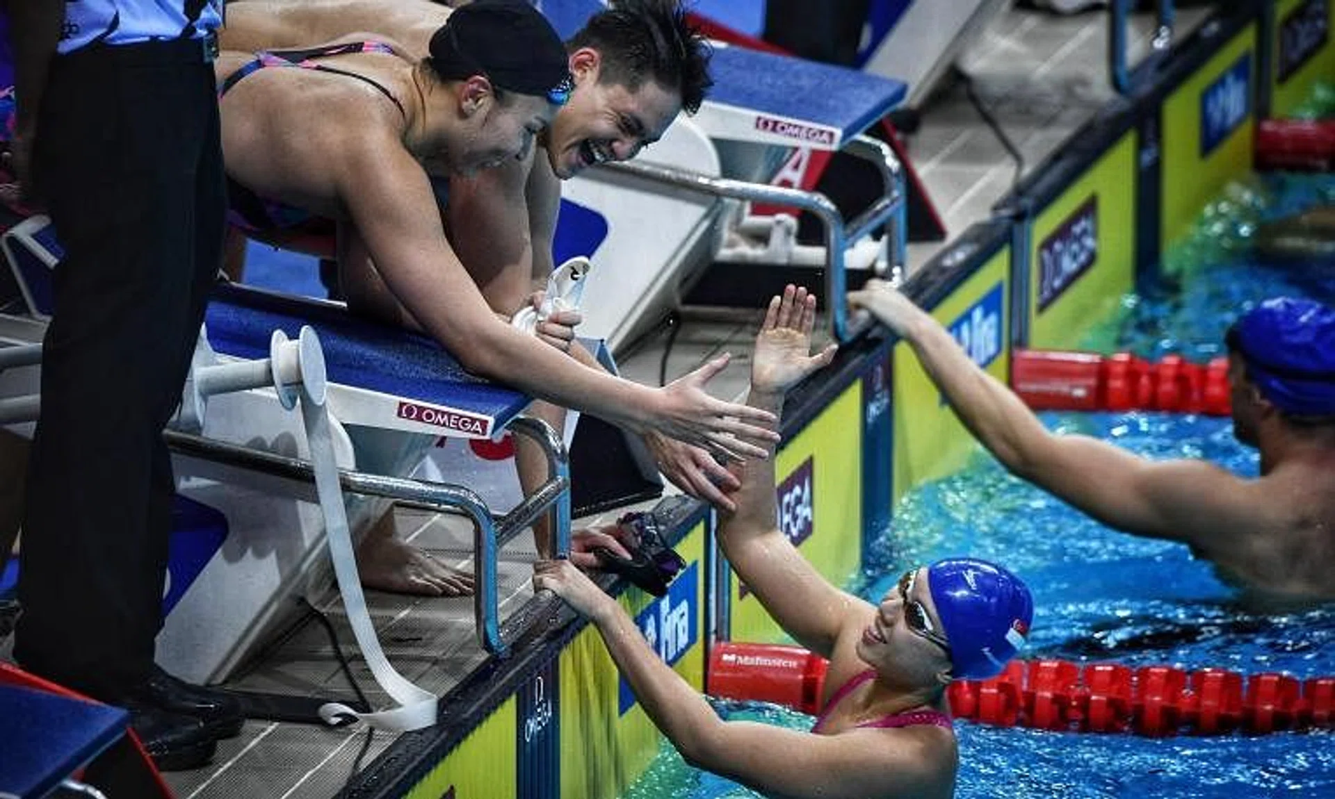 Singapore swimmers in high spirits during the 2018 Swimming World Cup at the OCBC Aquatic Centre in November 2018.