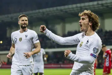 Griezmann shines as France maul Moldova