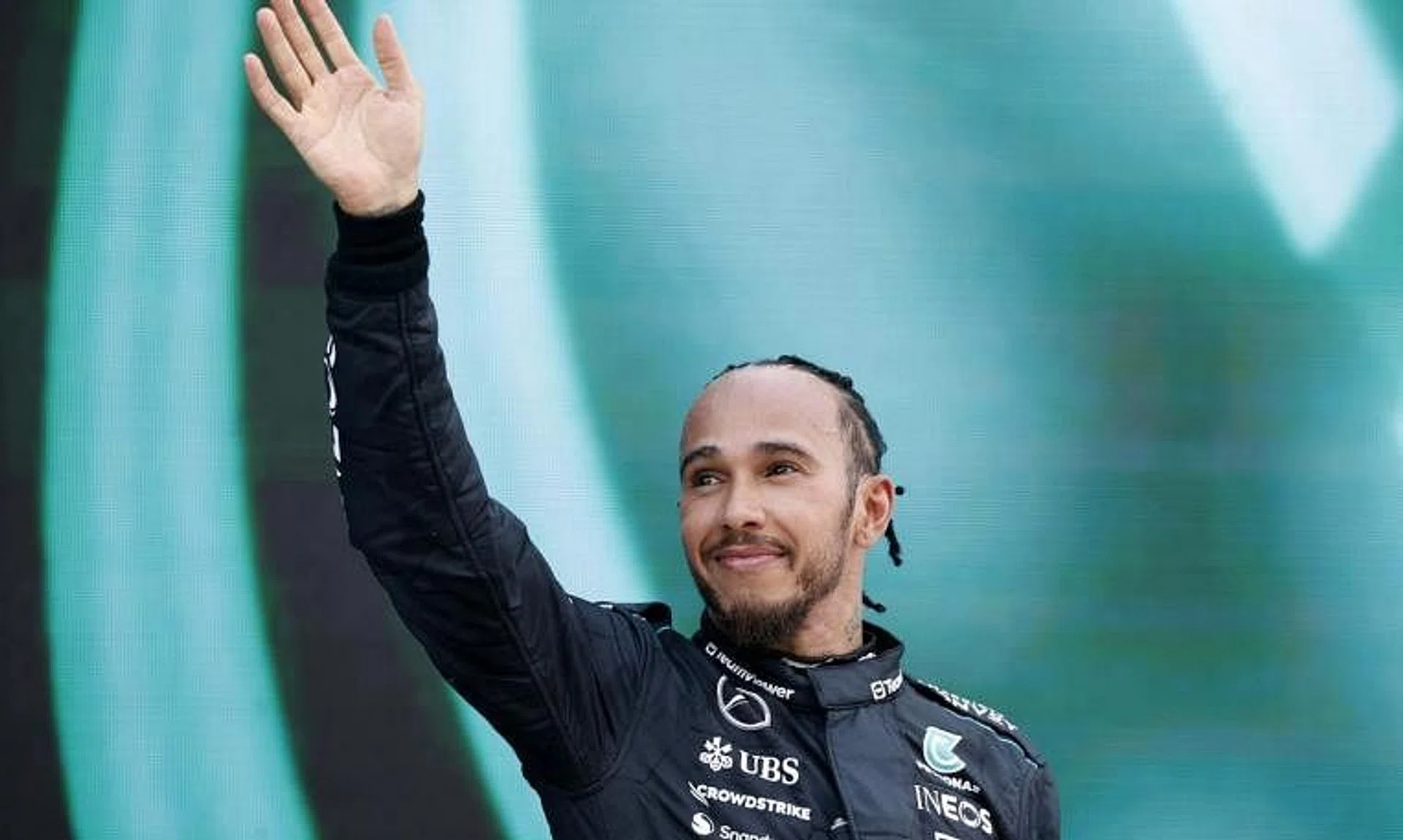 Formula One F1 - Spanish Grand Prix - Circuit de Barcelona-Catalunya, Barcelona, Spain - June 23, 2024 Mercedes' Lewis Hamilton celebrates on the podium after finishing third place in the Spanish Grand Prix REUTERS/Albert Gea