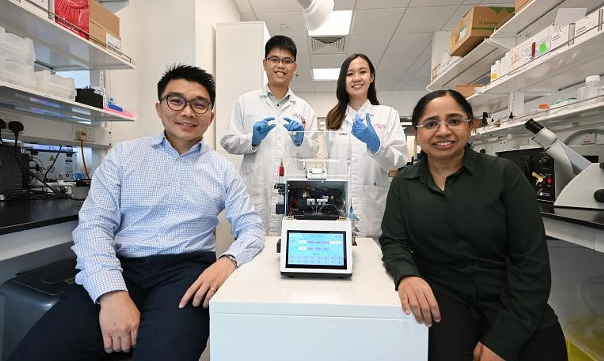 The NTU team consisting of (from left) Associate Professor Hou Han Wei, research fellow Leong Sheng Yuan and research engineer Lok Wan Wei, with Associate Professor Rinkoo Dalan, from TTSH.