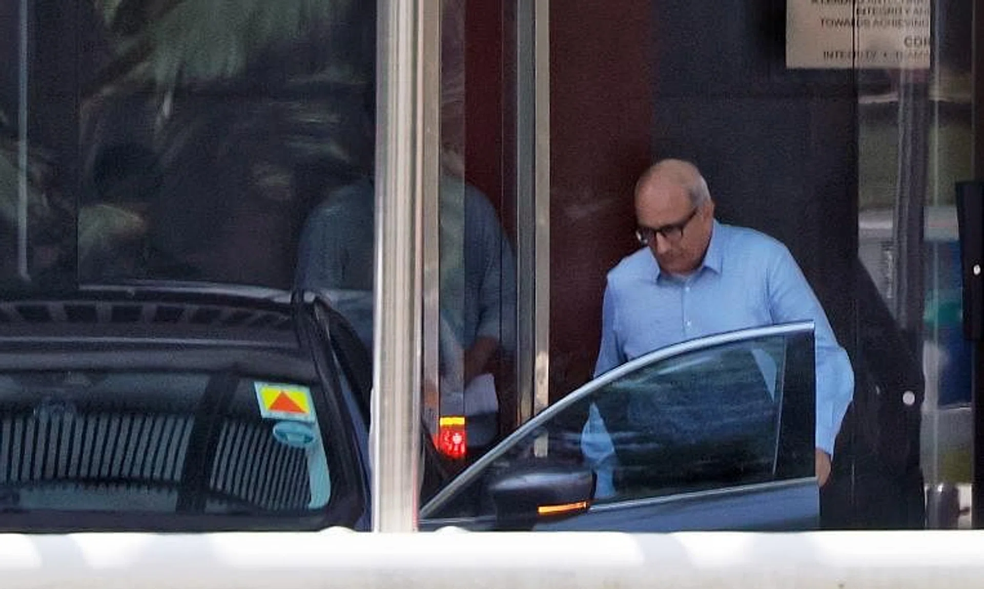 Transport Minister S. Iswaran leaves the CPIB headquarters in July 2023.