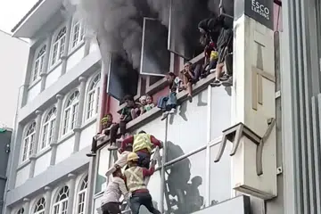 Fire breaks out in River Valley; children seen sitting on ledge