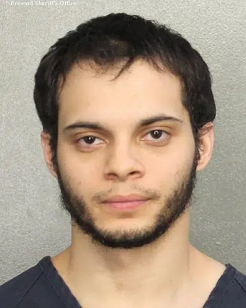 Airport shooter charged
