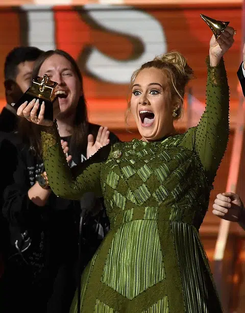 Adele triumphs over Beyonce in major Grammy categories