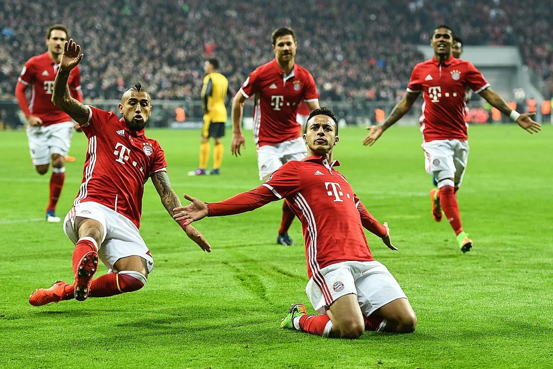 Singapore fans could see Bayern Munich stars like Thiago (right) and Arturo Vidal (left) in action during the summer break.