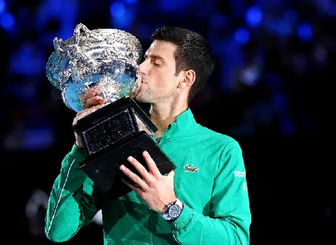 Dizzy, dehydrated Djokovic downs Thiem to win eighth Australian Open