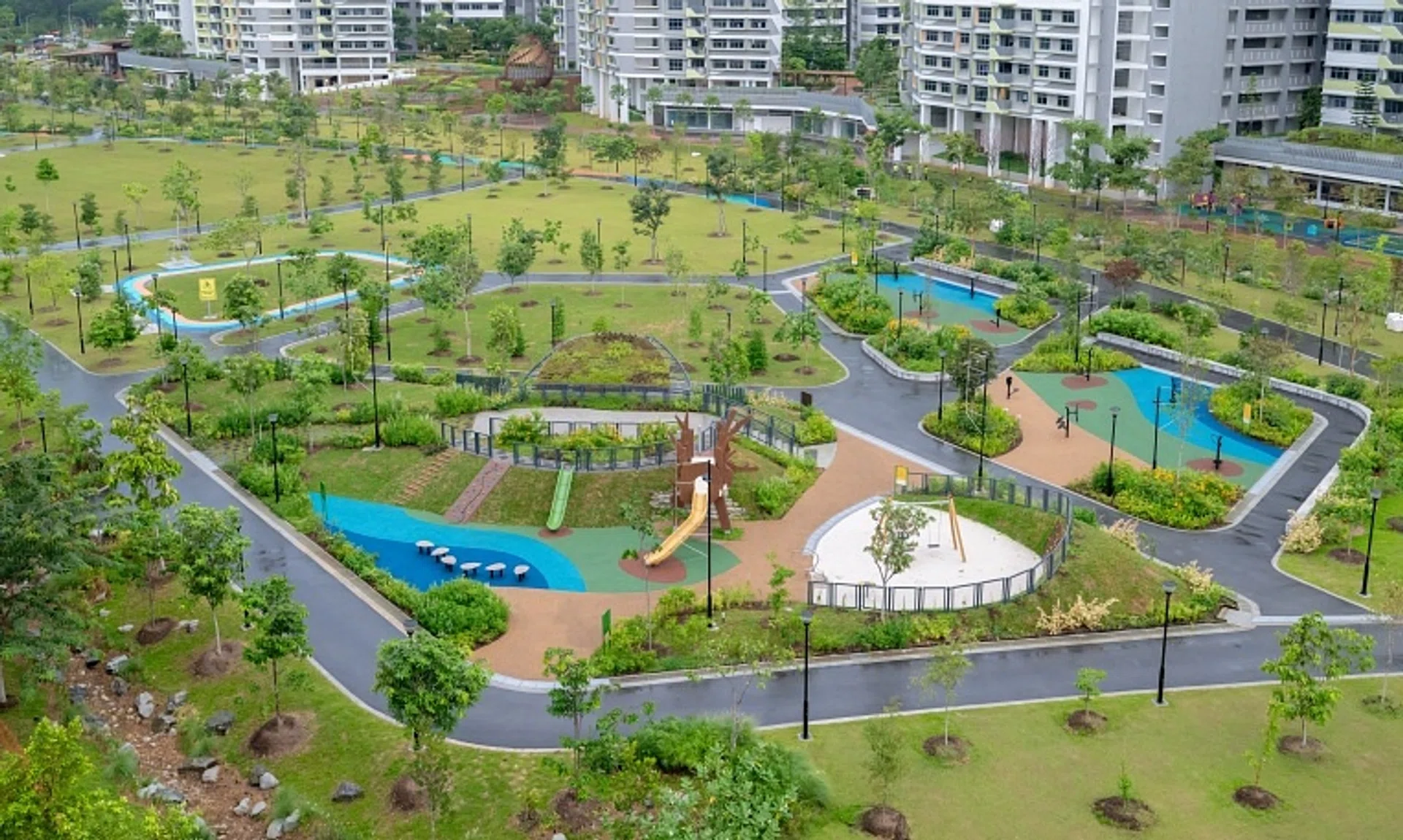 Tampines Boulevard Park’s west section features amenities like a cycling track for children, garden swings and an outdoor fitness area.