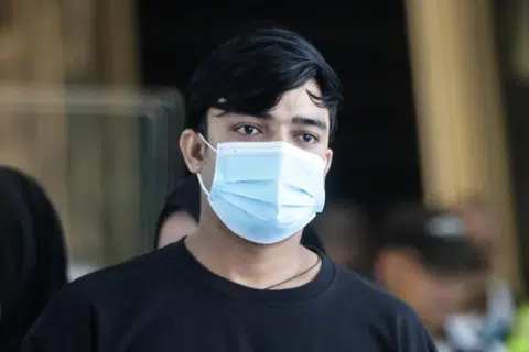 Two men accused of bribing male ICA officer with sex acts charged with corruption