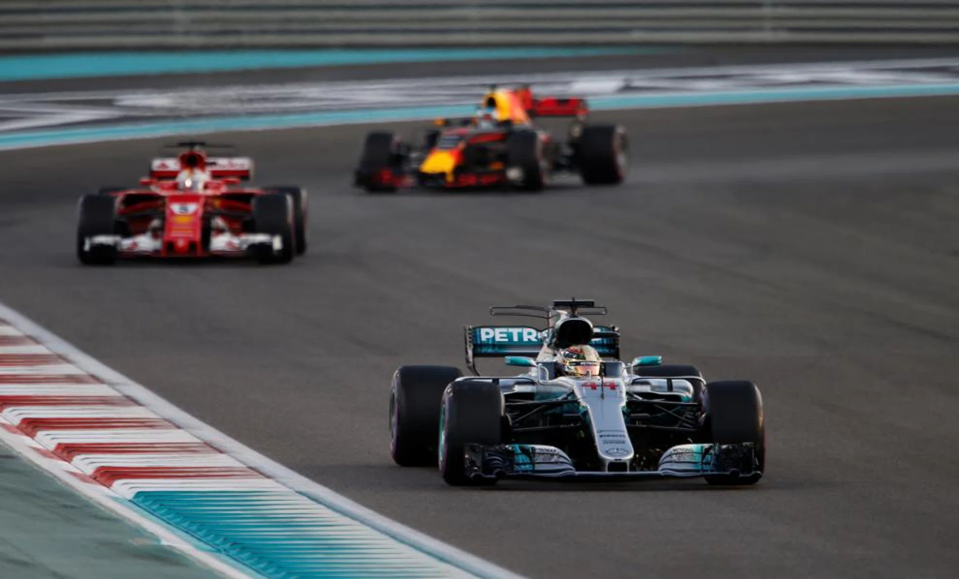 The likes of Mercedes' Lewis Hamilton (leading) and Ferrari's Sebastian Vettel (in red car) could be racing in Hanoi come 2020.