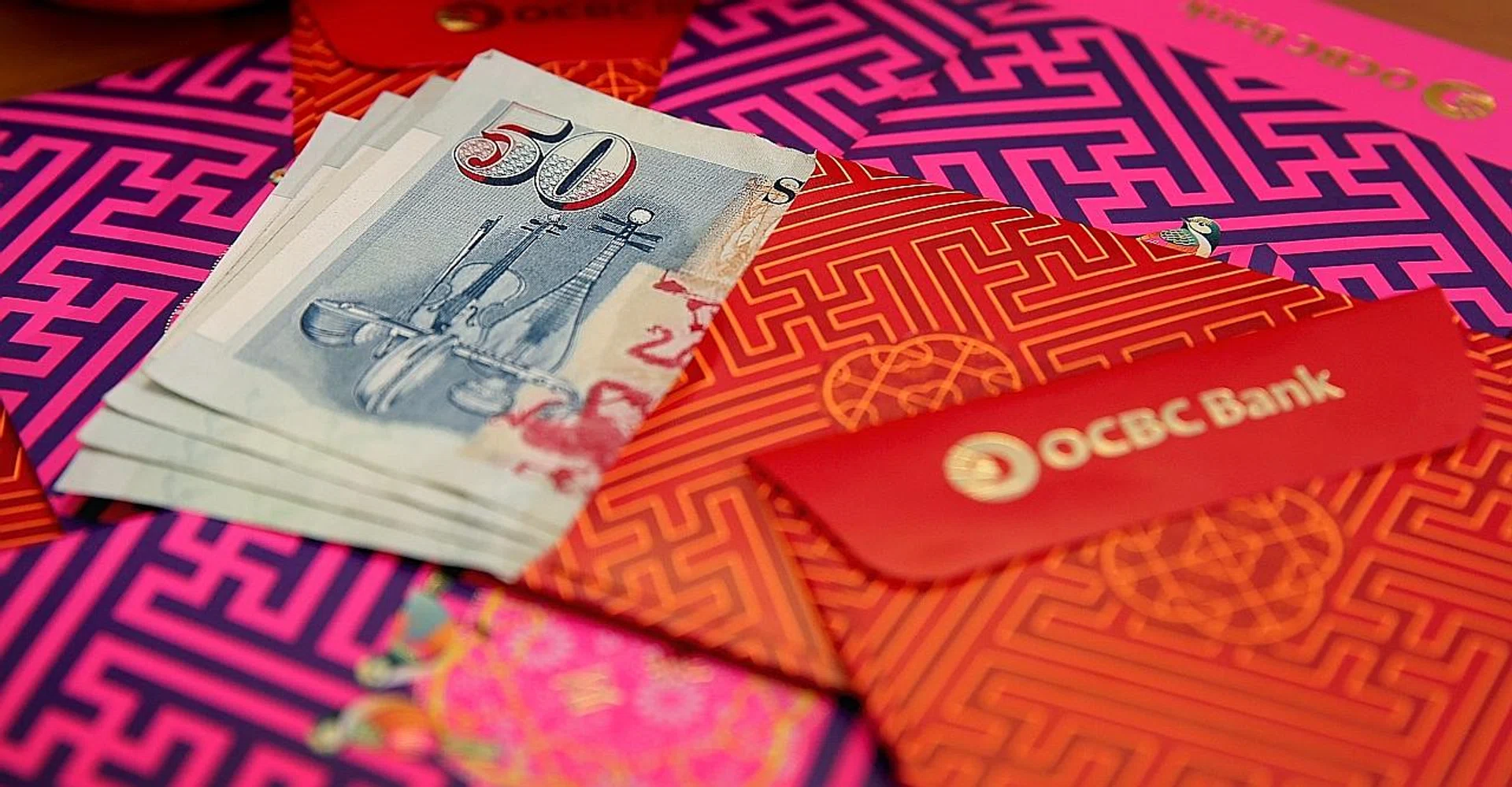 Infants of both genders received about $990 last year but the gap widened as they got older, said OCBC Bank. TNP PHOTO: PHYLLICIA WANG