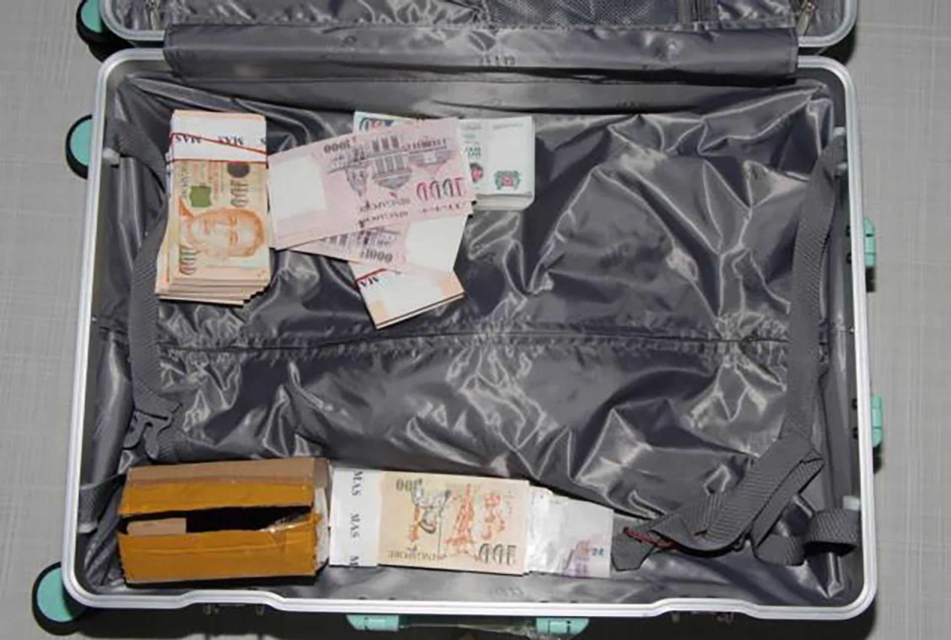 Officers seized items including over $88,000 in cash and two motor vehicles with a combined value of more than $1 million.