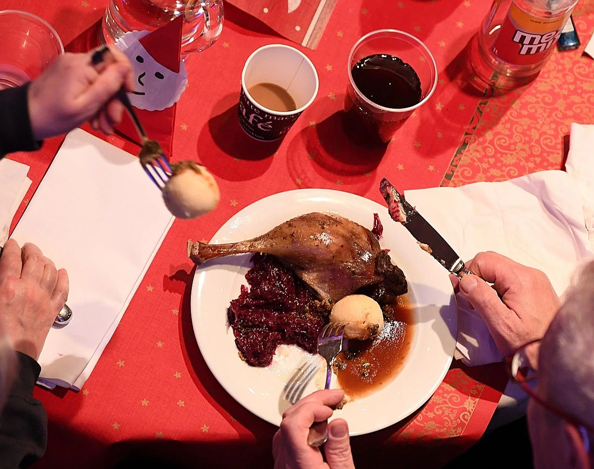 Before heading to a party, try eating some healthy snacks or drinking water to prevent overeating at the gathering. (Below) Novi Health dietitian Rddhi Naidu. PHOTOS: REUTERS, COURTESY OF RDDHI NAIDU