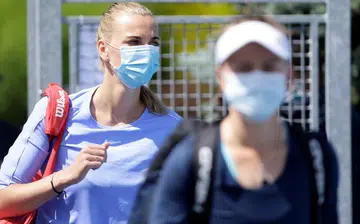 Ball boy saves the day for fan-craving Kvitova