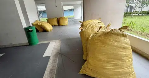Man orders 1,300kg of clothes, delivery company leaves them at HDB void deck