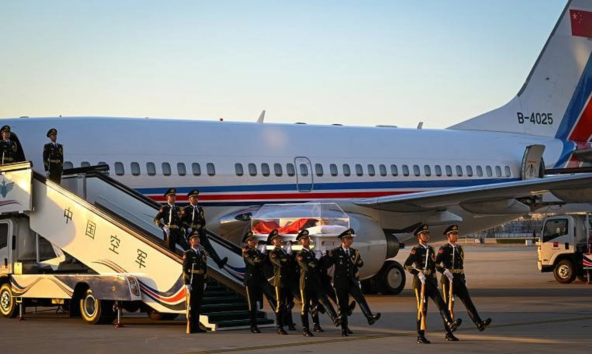 The remains of former Chinese President Jiang Zemin are transferred from Shanghai aboard a special flight, in Beijing, on Dec 1, 2022.