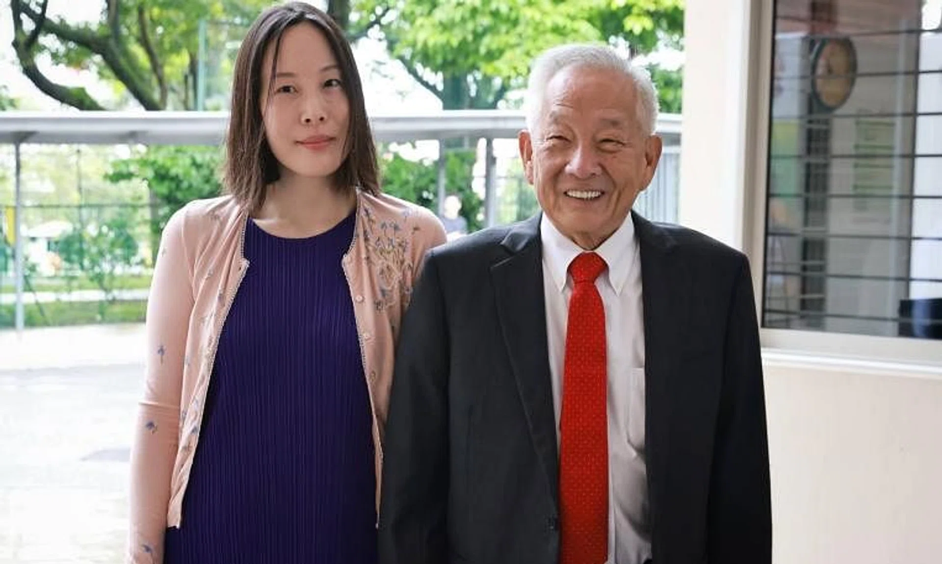 Mr Ng Sok Kong, accompanied by his fiancee, at the Elections Department on July 19, 2023.