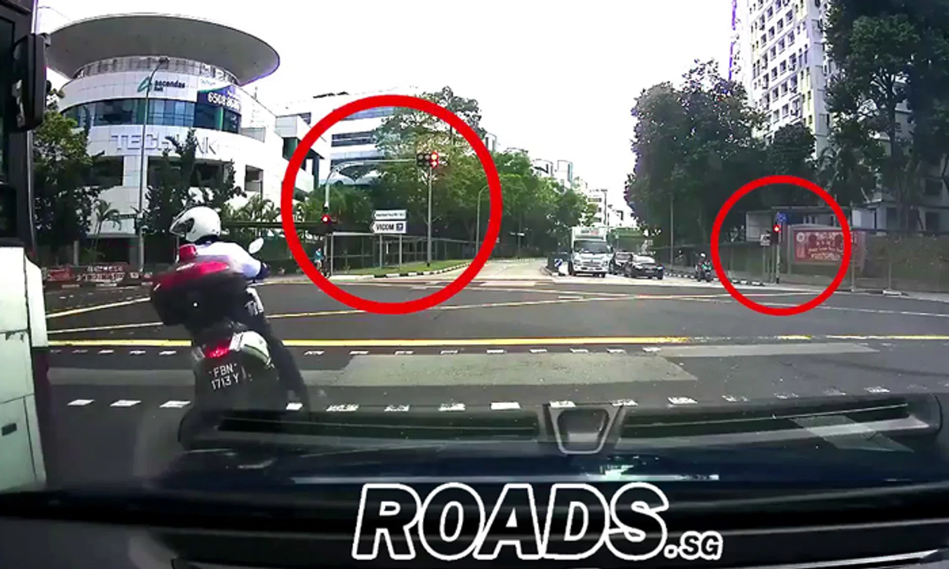 A Certis parking warden who was caught on camera beating the red light on Feb 22.