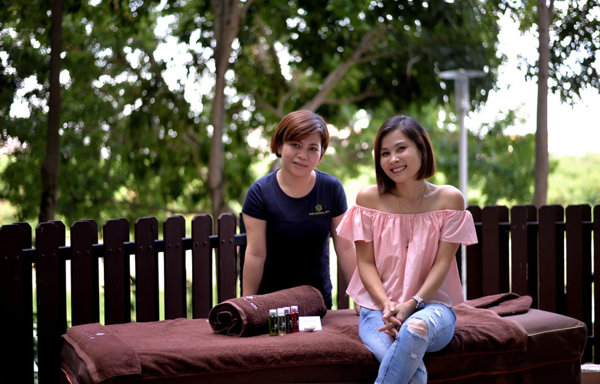 The co-founder of The Outcall Spa, Ms Stella Tan (right), and one of the massage therapists, Flora.