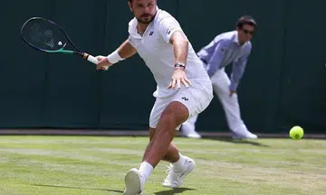 Stan Wawrinka hopes to 'not get killed' by Novak Djokovic at Wimbledon