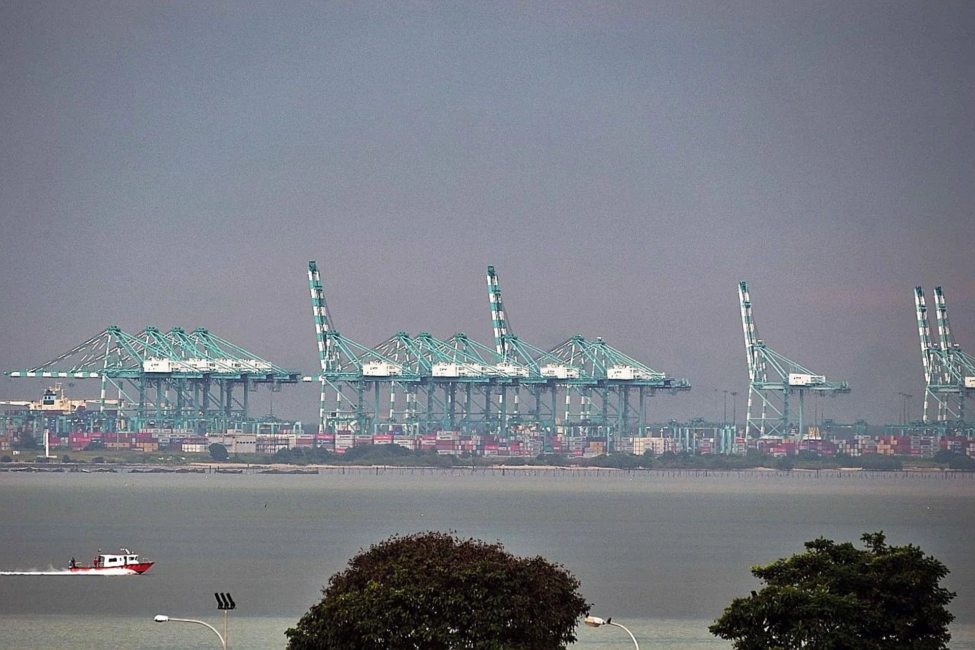 The view from Tuas across the Strait of Johor towards the Johor Baru port. 