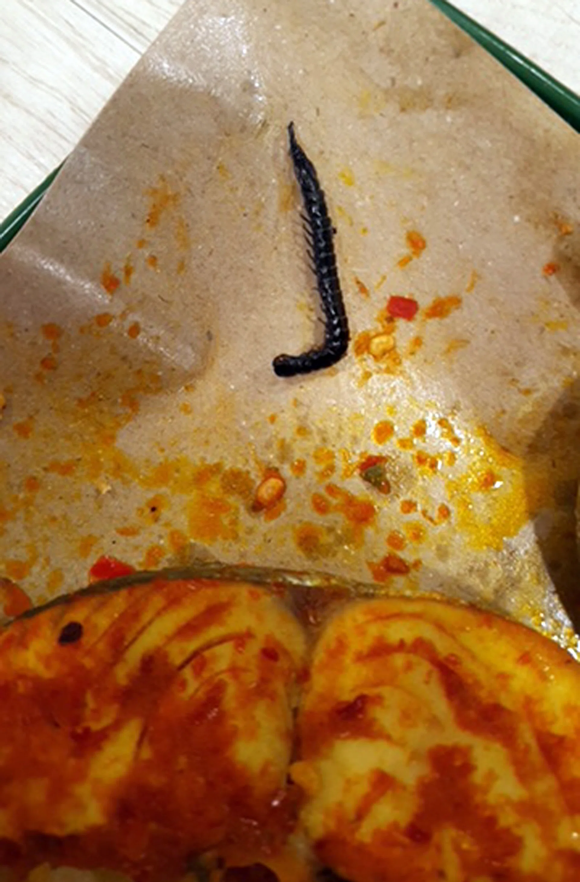 SHOCKED: Madam Safina Mohamed Mohamed said she found a black centipede (above) in the meal she bought at Punggol Nasi Padang.
