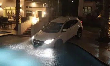 Hillside condo management seeks damages from Gojek after car ends up in pool