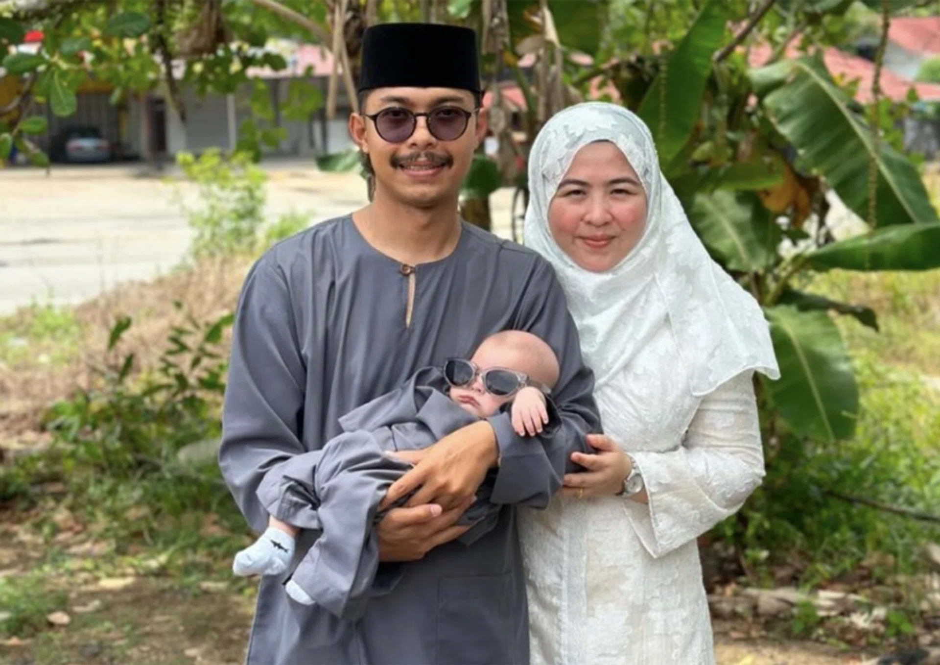 Madam Norshahirah Nabihah Mohammad Azan with her husband Muhammad Isma Azwa Md Salleh and their baby Yusuf.