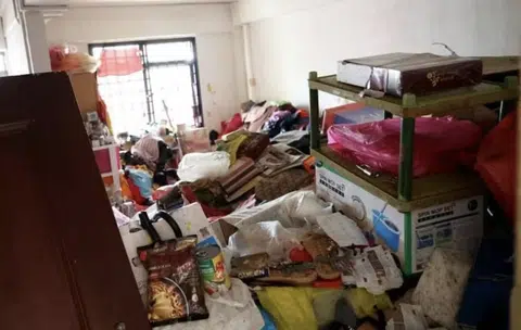 SCDF removes hoarder's HDB flat door to get to decomposing body