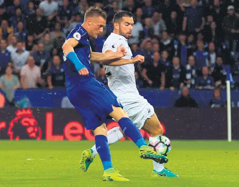 Vardy's back in the goals for champions