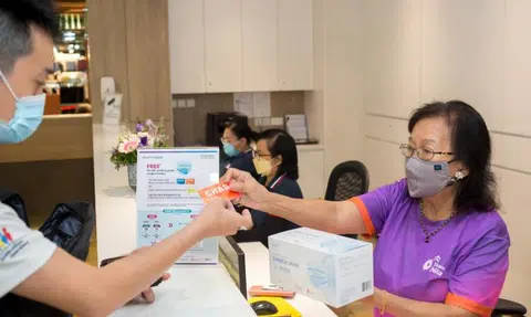 Over 730,000 boxes of masks collected in Temasek distribution drive for lower-income families